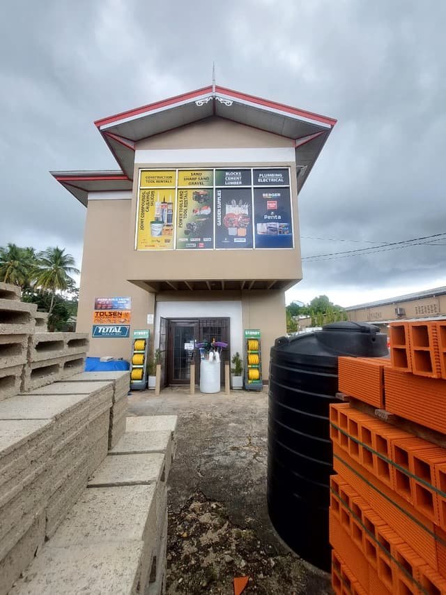 The Jamaal’s Hardware storefront with blocks, tanks and building supplies out front